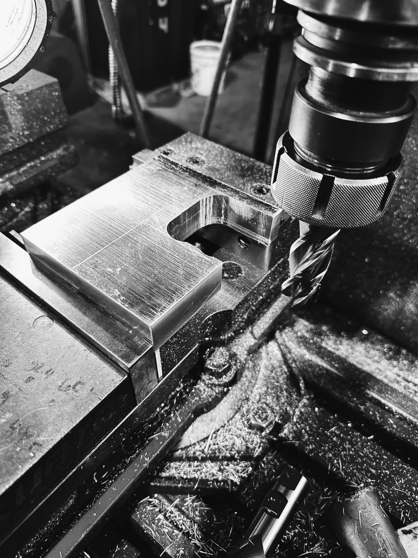 CNC mill cutting an aluminum part